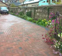 Paved red brick driveway