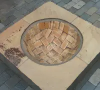 bowel carved out of stone blocks